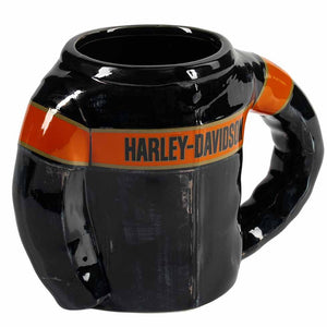 A glossy black ceramic mug shaped like a motorcycle tank, featuring an orange band around the middle with the text 'HARLEY-DAVIDSON' in black letters.