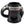 A glossy black ceramic mug designed in the shape of a Harley-Davidson motorcycle tank, featuring the brand's logo on a white stripe with orange accents.