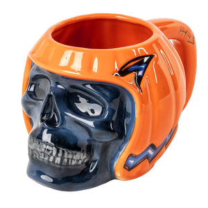 A ceramic mug shaped like a skull wearing an orange football helmet, with a dark blue skull face and a small Carolina Panthers logo on the side, shown on a white background.