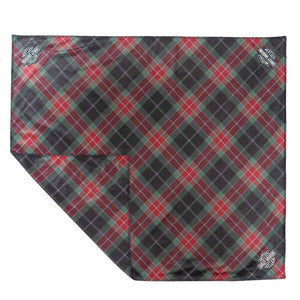 Plaid patterned blanket with visible brand logos on a white background