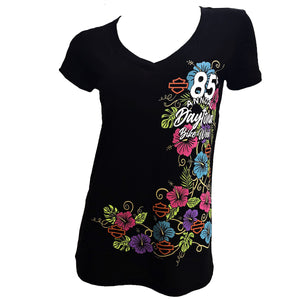 Black t-shirt with colorful floral design and text on a white background