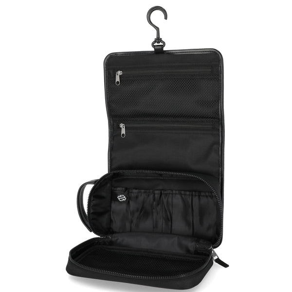 Black travel toiletry bag with hanging hook on a white background