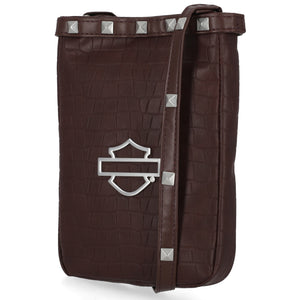 Brown leather bag with silver studs and emblem on a white background