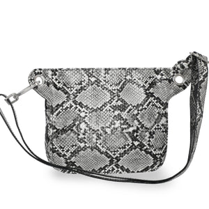 Snake print handbag with a strap on a white background