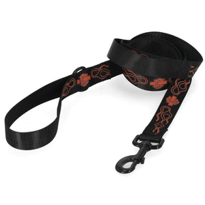 A black webbed dog leash with a black swivel snap hook clasp and a repeating orange Harley-Davidson logo pattern, shown on a plain white background.