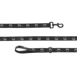 A black dog leash with a repeating white skull and paw print pattern, featuring a black metal clasp and a padded carrying loop, shown against a plain white background.