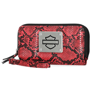 Red and black snake print wallet with a silver emblem on a white background