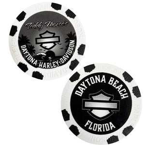 Two poker chips with Daytona Beach Harley-Davidson branding on a white background