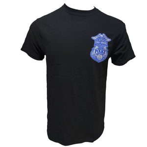 Black t-shirt with a blue police badge emblem on a white background
