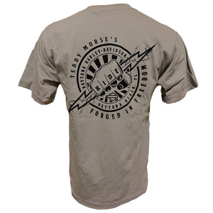 Beige t-shirt with black graphic design on the back on a white background