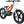 Children's electric bike with orange frame and gray body on a white background