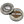 Harley-Davidson branded metal coin with skull design on one side and logo on the other, on a white background.